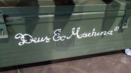 Photo for Bordeaux , Aquitaine France - 12 12 2022 : Deus Ex Machina logo text and brand sign on steel box fashion boutique clothes motorbike skate concept shop - Royalty Free Image