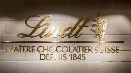 Photo for Bordeaux , Aquitaine France - 12 12 2022 : Lindt logo text and brand sign shop interior store wall of Swiss chocolate company chocolatier - Royalty Free Image