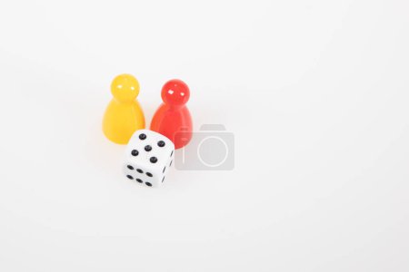 Photo for Colorful game red yellow pawns with six sided dice - Royalty Free Image