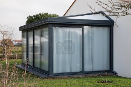 Téléchargez les photos : Modern window of veranda grey in home garden - en image libre de droit