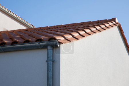 Photo for Grey round silver aluminium gutter system corner house facade - Royalty Free Image