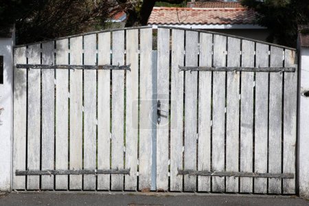 Photo for Portal old white wooden gate of private house suburb wood home door entrance driveway - Royalty Free Image