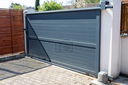Aluminum design grey metal gate of modern suburb house steel engine doors fitting remote control portal Electrical Automatic door entrance