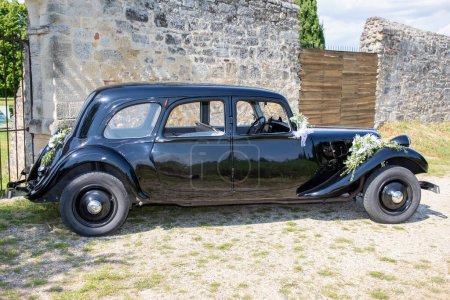 Photo for Bordeaux , Aquitaine  France - 06 06 2023 : citroen traction avant vintage classic car with wedding flowers decoration - Royalty Free Image