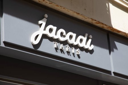 Foto de Burdeos, Aquitania Francia - 06 06 2023: Jacadi Paris text logo and brand sign wall entrance facade boutique clothing shop for children - Imagen libre de derechos