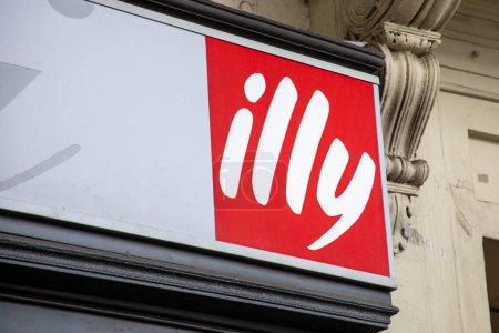 Photo for Milan , Italy  - 07 05 2023 : Illy coffee shop red sign logo cafe leading Italian coffee makers text brand bar wall facade entrance - Royalty Free Image