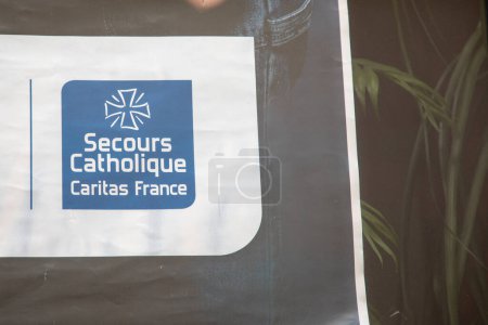 Photo for Annecy , France - 06 16 2023 : Secours catholique caritas france logo sign and brand text of french Rescue Catholic help solidarity homeless and religion charity poverty in office entrance - Royalty Free Image