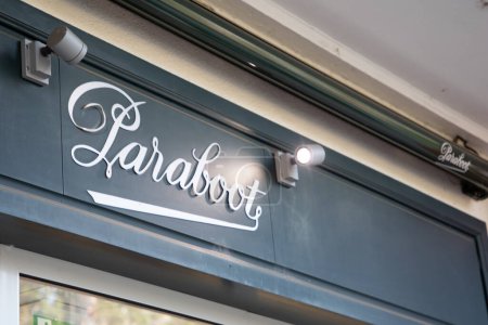 Milan , Italy  - 07 10 2023 : Paraboot logo brand and sign text wall facade shop chain above the entrance to the store