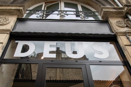 Photo for Bordeaux , France -  08 01 2023 : Deus Ex Machina logo brand and sign text front wall facade fashion clothes motorbike concept store - Royalty Free Image