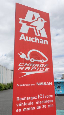 Photo for Bordeaux , France -  08 19 2023 : Auchan nissan text for charger point ev car electric in park supermarket with logo sign brand store shop - Royalty Free Image
