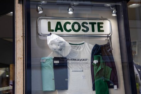 Foto de Burdeos, Francia - 09 18 2023: lacoste logo sign shop and brand text store famous french chain of luxury polo sport clothing boutique - Imagen libre de derechos