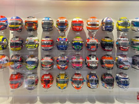Photo for Llanera , Spain - 10 02 2023 : formula one F1 helmets in Fernando Alonso in spain museum - Royalty Free Image
