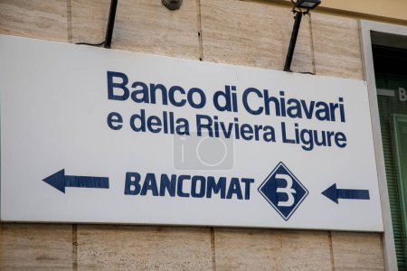 Photo for Milan,  Italy - 11 07 2023 : banco di Chivari e della riviera ligure logo brand and text sign bank bancomat atm signage on wall facade Italian bank - Royalty Free Image
