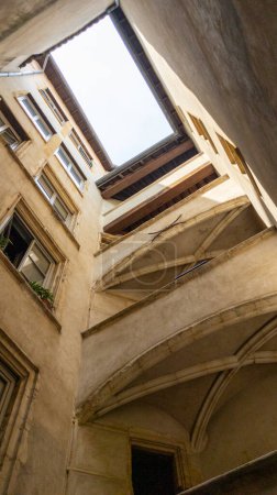 Photo for Old medieval secret interior courtyard with restricted access as shortcuts Traboules in Lyon city France - Royalty Free Image