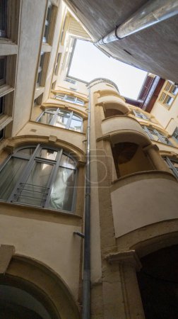Photo for Traboule in lyon city traditional passageway through houses restricted access as shortcuts between two streets france - Royalty Free Image