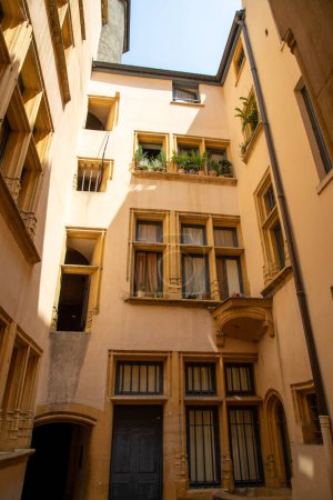 Photo for Traboule in lyon city traditional passageway through houses between two streets secret interior courtyard and restricted access as shortcuts - Royalty Free Image