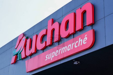 Photo for Bordeaux , France -  01 06 2024 : Auchan supermarche logo brand and text sign facade wall entrance of French group of hypermarket supermarket in france - Royalty Free Image