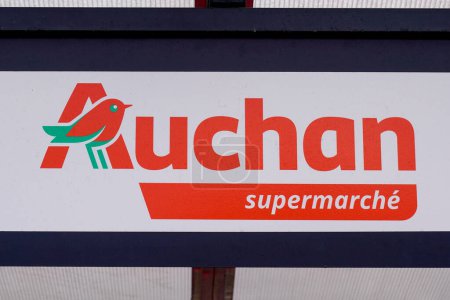 Photo for Bordeaux , France -  01 06 2024 : Auchan supermarche supermarket logo brand and text sign on facade wall entrance store French grocery retailer shop - Royalty Free Image