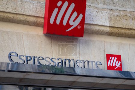 Photo for Bordeaux , France -  02 19 2024 : Illy espressamente coffee shop red sign brand and text logo cafe Italian coffee makers in wall entrance bar - Royalty Free Image