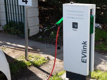 Photo for Bordeaux , France -  03 04 2024 : Schneider electric Evlink electric car charging station park automobile electric vehicle supply equipment company - Royalty Free Image