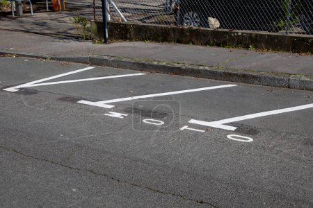motorcycle parking sign on street road in text moto asphalt