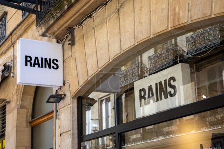 Foto de Burdeos, Francia - 03 12 2024: rains logo brand and text sign on wall facade storefront fashion business - Imagen libre de derechos