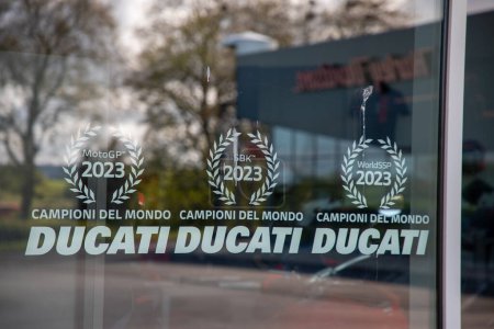 Photo for Bordeaux , France -  04 29 2024 : Ducati logo brand stickers windows and text sign front of shop motorbike dealership of italian motorcycle manufactured store - Royalty Free Image
