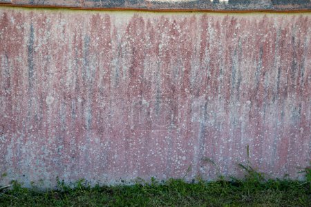 Photo for Gray pink wall roughcast concrete facade cement red grey wallpaper plastered background - Royalty Free Image