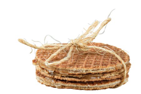 Photo for Closeup of several stroopwafels cookies with a sisal bow (side view)_white background. - Royalty Free Image