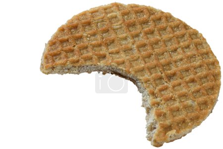 Photo for Closeup of a lone stroopwafel cookie with a bite_white background. - Royalty Free Image