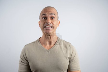 Caucasian, Brazilian man, 48 years old, in the studio showing emotions_4.