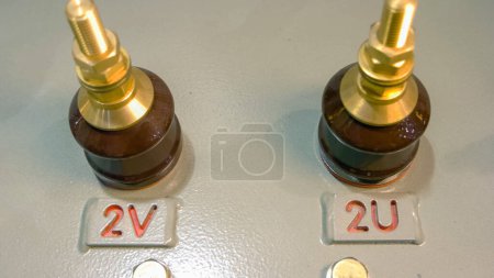 Photo for Close-up industrial machine valves for voltage regulation. Control panel with screw nuts. - Royalty Free Image