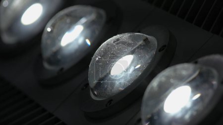 Photo for Close-up of turning on diode LED lights. Semisphere reflective glass lamps. - Royalty Free Image