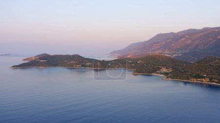 Photo for Aerial view of mountain island. Landscape of sea bay with green rocky shore. Beautiful nature scenery. - Royalty Free Image