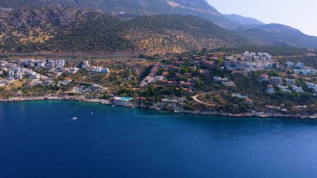 Photo for Cityscape of coastal town on the background of mountains. Aerial panoramic view from drone. Travel concept. - Royalty Free Image