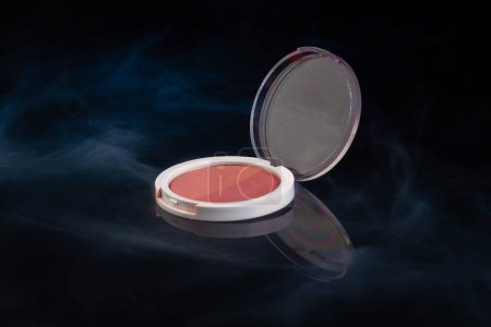 Photo for Pink color make up powder in round shape container. Close up of cosmetic make up box. - Royalty Free Image