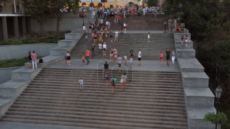 Foto de Odesa, Ukraine - 08.08.2020: Potemkin stairs in Odessa city with traffic of people. Urban city scape. - Imagen libre de derechos