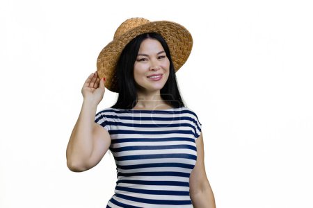 Photo for Portrait of cheerful young asian woman in straw hat. Isolated on white. - Royalty Free Image