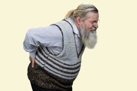 Photo for Aged long-bearded man suffering from back pain. Isolated on white. - Royalty Free Image