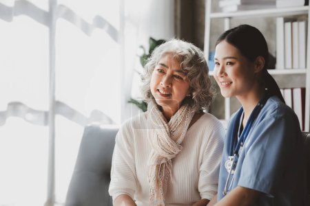 Photo for Doctors are talking to explain medication and health care to elderly patients, elderly people with underlying diseases need to be closely monitored by doctors and relatives. caring for the elderly. - Royalty Free Image