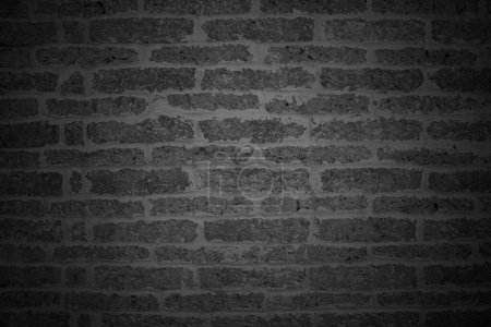 Black brick wall texture background with vintage style for design art work.