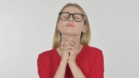Téléchargez les photos : Casual Young Woman Praying with Folded Hands on White Background - en image libre de droit