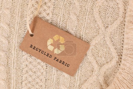 Photo for Knitted fabric with label saying 'recycled fabric' - Royalty Free Image