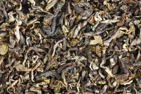 Foto de Close up of Chinese 'Jin Xiang'  Oolong tea herb leaves - Imagen libre de derechos