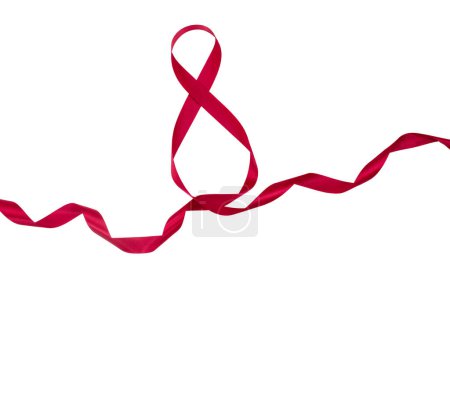 Foto de Number 8 eight from silk twisted red ribbon on white background. International Women's Day, birthday. Design element. Copy space - Imagen libre de derechos