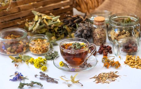Photo for Herbal tea with medicinal herbs and flowers. Selective focus. Drink. - Royalty Free Image