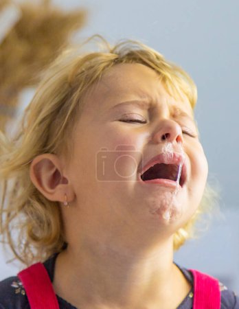 Photo for The child has snot, the child is crying. selective focus. Kid. - Royalty Free Image