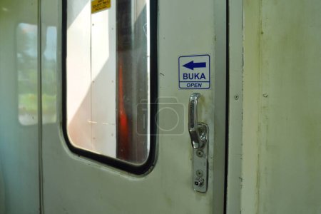 The door handle that is opened by sliding on the end of railroad car.