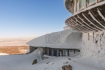 Winter morning,  disc shaped meteorological observatory in snezka, mountain on the border between Czech Republic and Poland.
