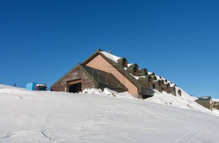 Cottage Vyrovka,  cottage covered by snow, height quota 1356  m,  krkonose mountains Czech Republic